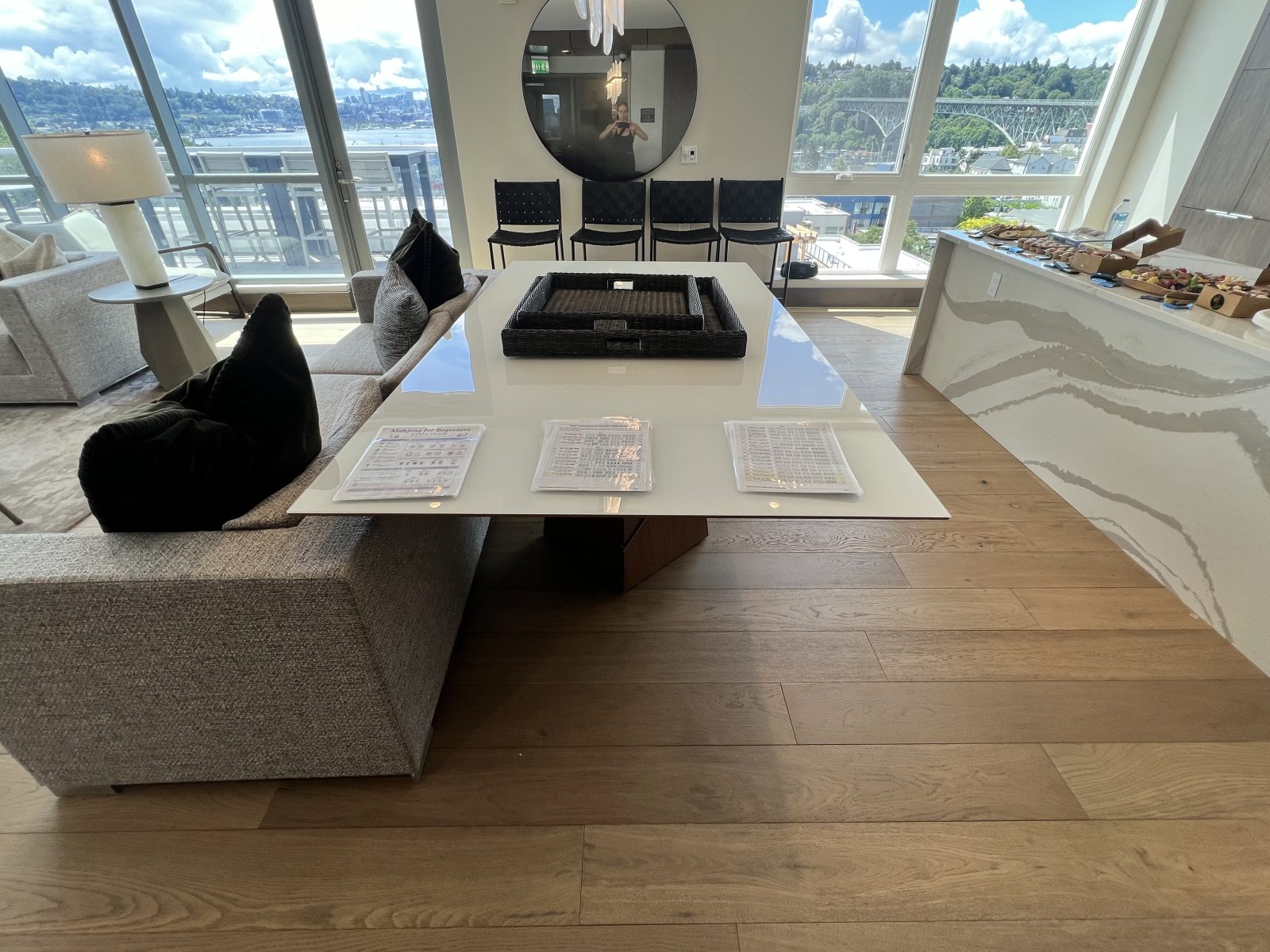 The living room and island with sweeping water views